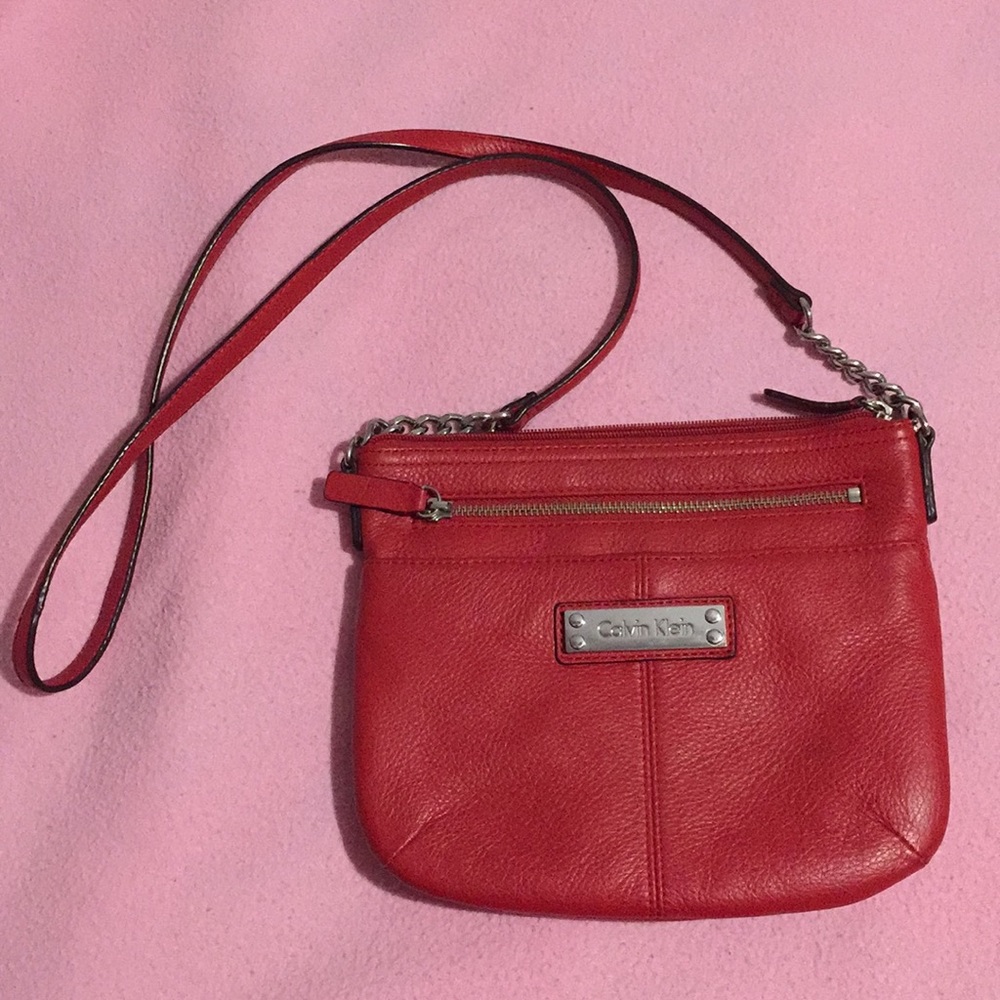 Calvin Klein crossbody handbag. 91/2 x 81/2. Length 30”